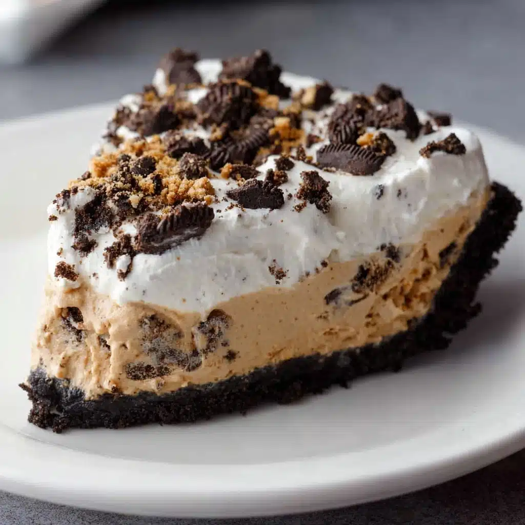 No Bake Oreo Peanut Butter Cup Cheesecake Recipe - Recipe Image