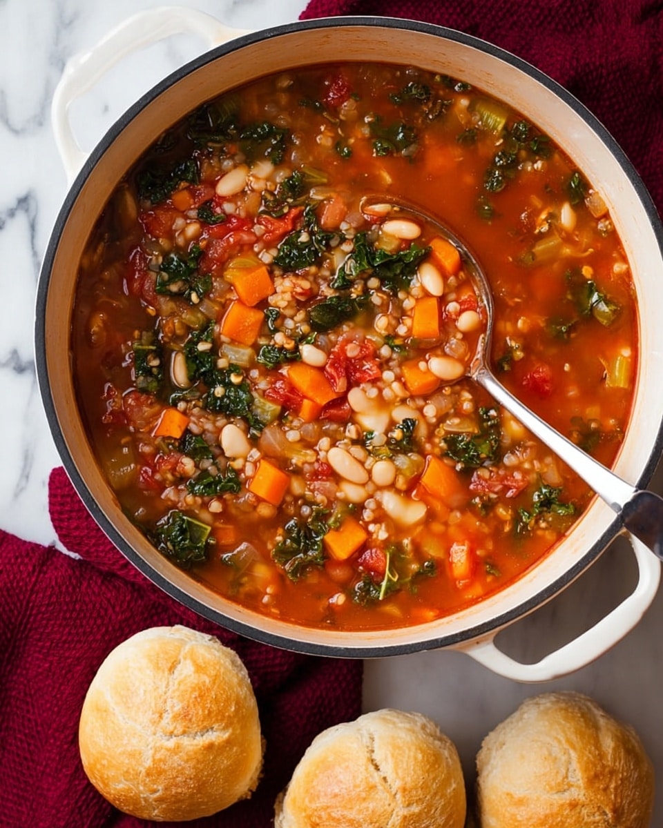 A white pot filled with thick vegetable soup sits on a white marbled surface, showing many layers and colors: chunks of orange carrots, green kale leaves, white beans, red tomato pieces, and brown lentils all mixed in light red broth, a silver ladle resting inside the pot. Next to the pot, three golden brown round bread rolls with light crust sit on a dark red cloth. The whole scene is bright and clear, showing the texture of the soup and bread well. photo taken with an iphone --ar 4:5 --v 7